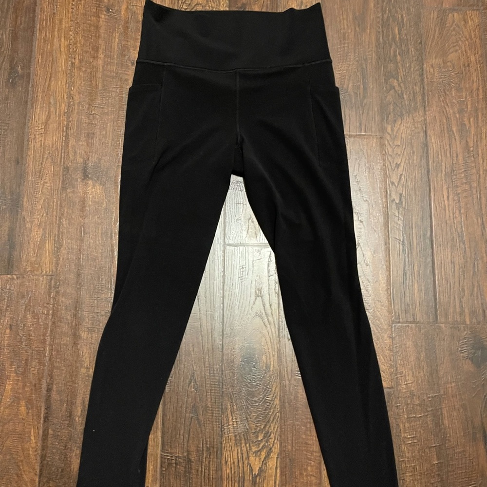 Athleta salutation stash pocket leggings medium